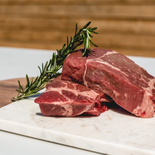 two steaks and some rosemary ready for the bbq 1