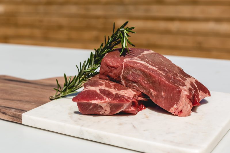 two steaks and some rosemary ready for the bbq 1